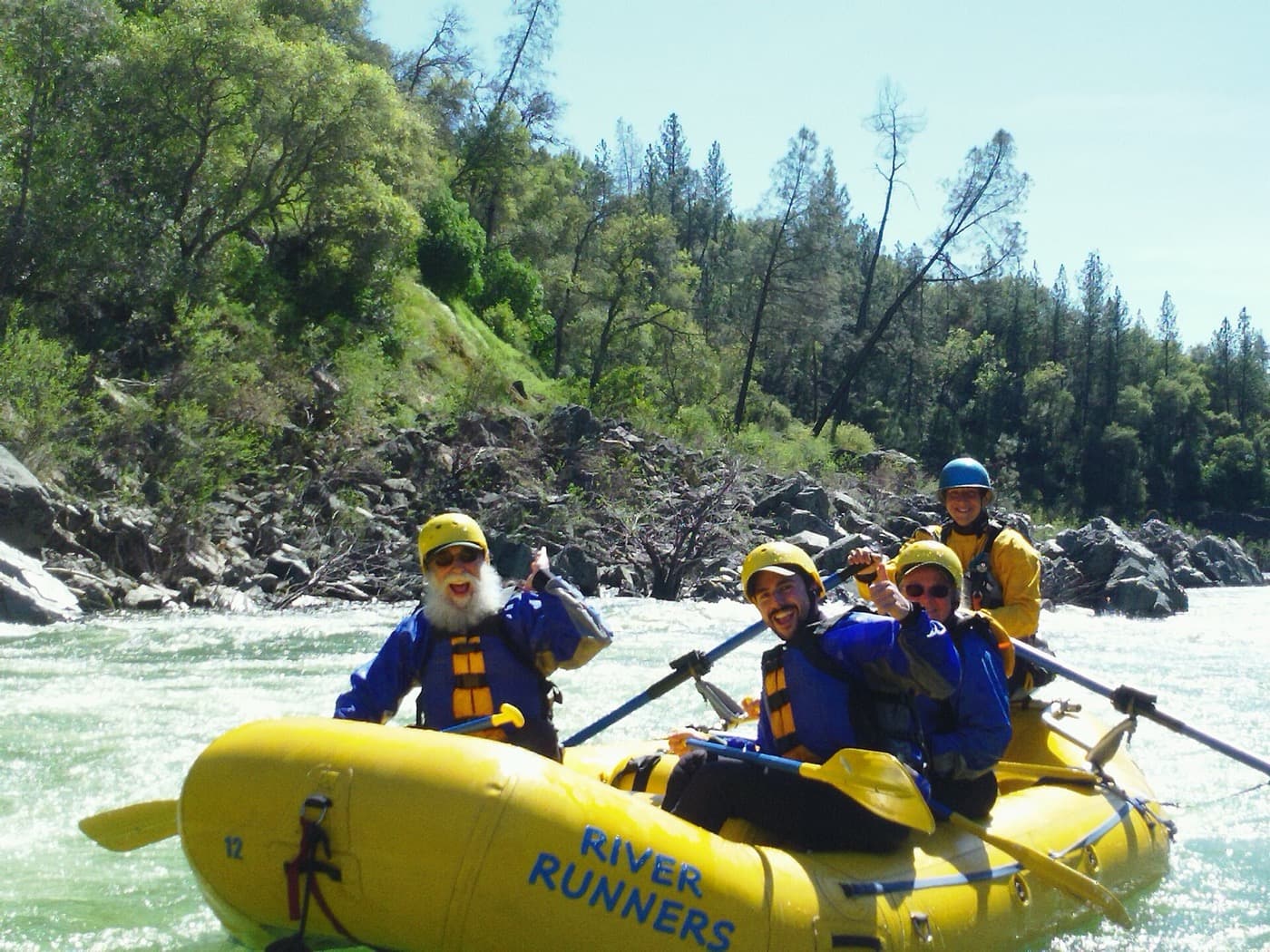 A River Runners raft in high spring flows on the South Fork of the American River